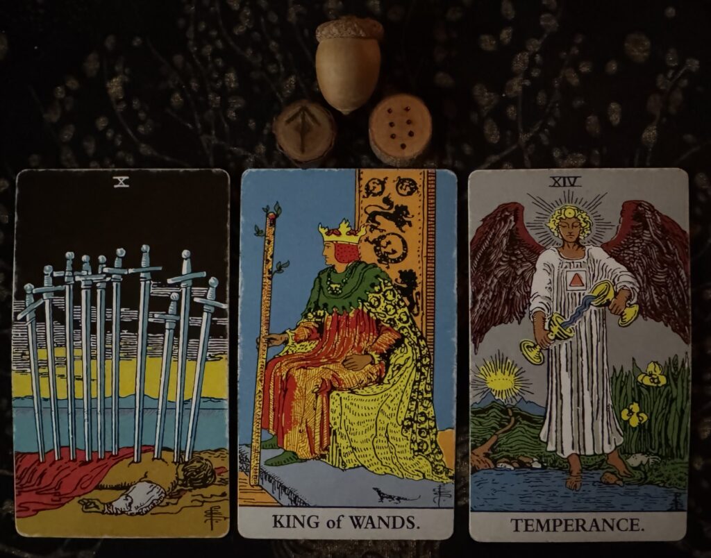 Runes: Tiwaz, Tristitia
Cards: 10 of Swords, King of Wands, Temperance